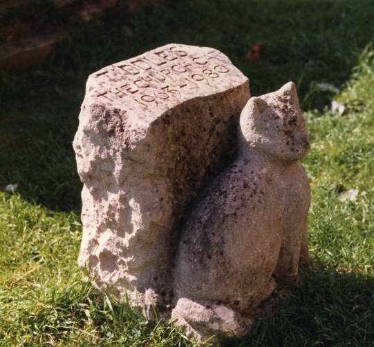Tiddles commemorative stone in St Mary's Churchyard, Fairford, Gloucestershire.